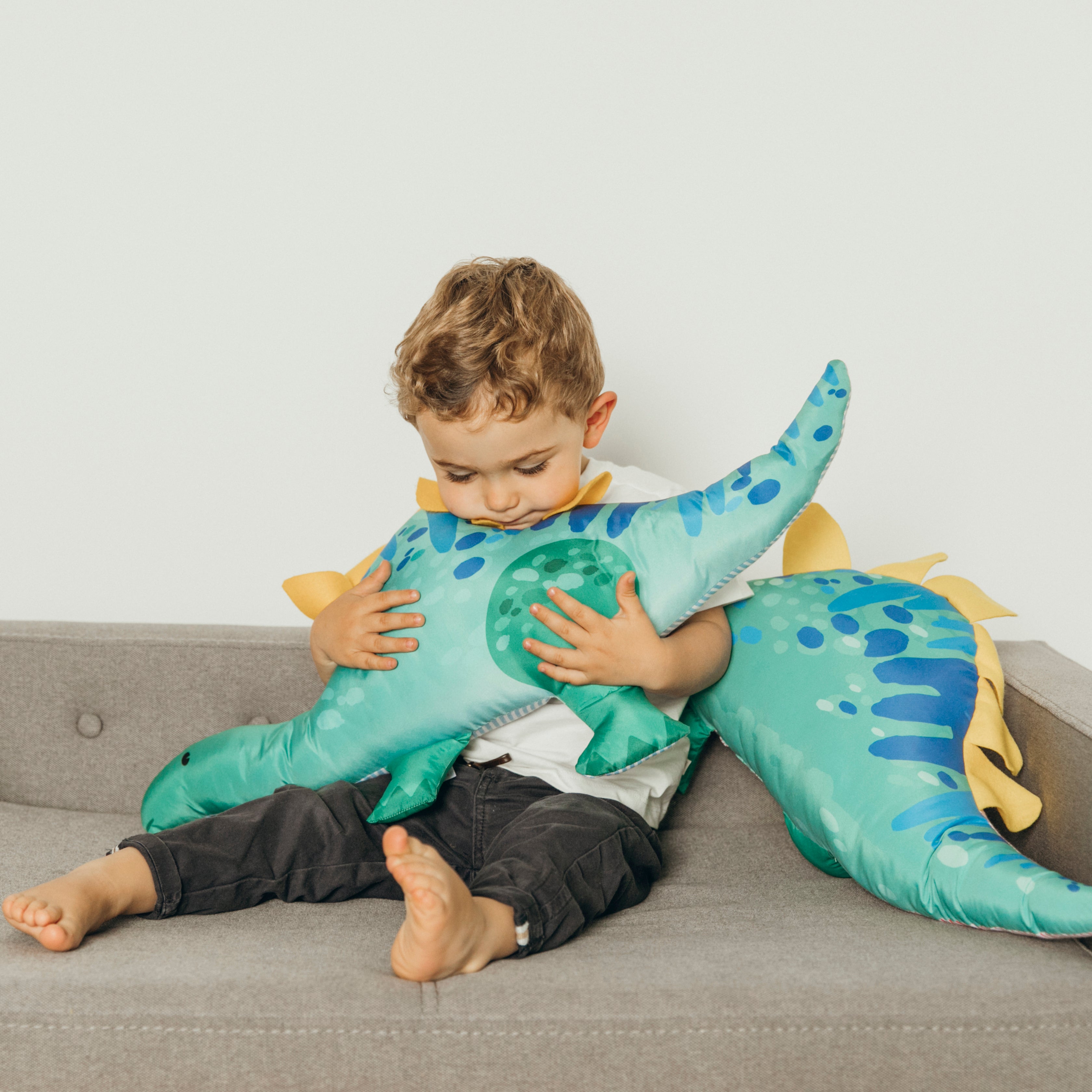 Combo cobija dinosaurios + cojín dinosaurio